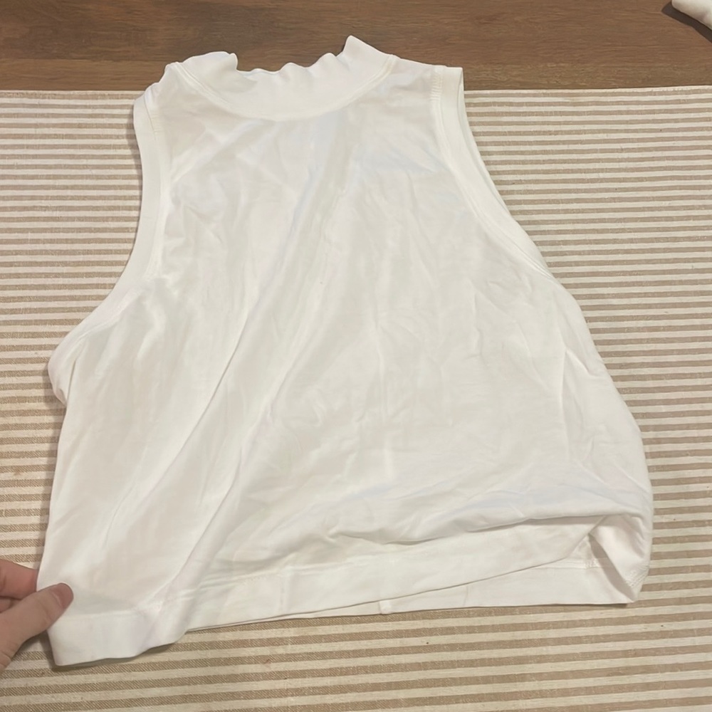Never been worn lululemon crop halter size 4